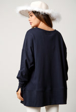 Load image into Gallery viewer, Candy Cane oversized sweatshirt on navy blue